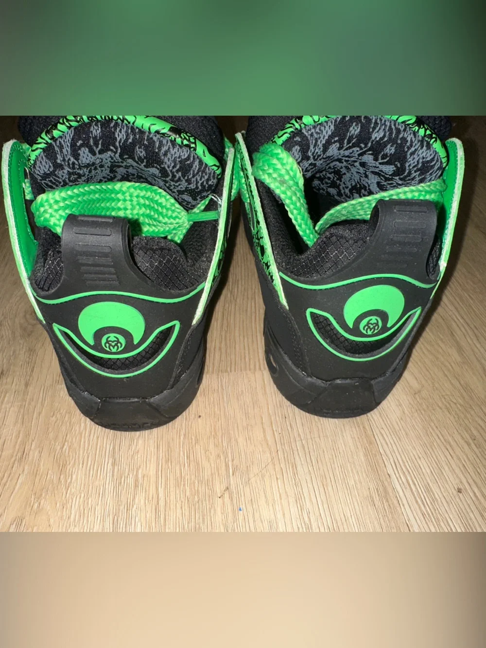 Osiris Black and Neon Green High-Top Athletic Sneakers